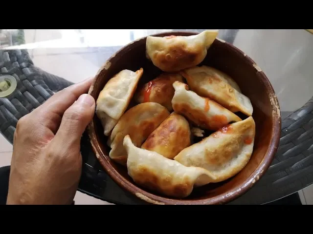 【】梧州的水饺,点了份香煎马蹄的,10块钱10个!